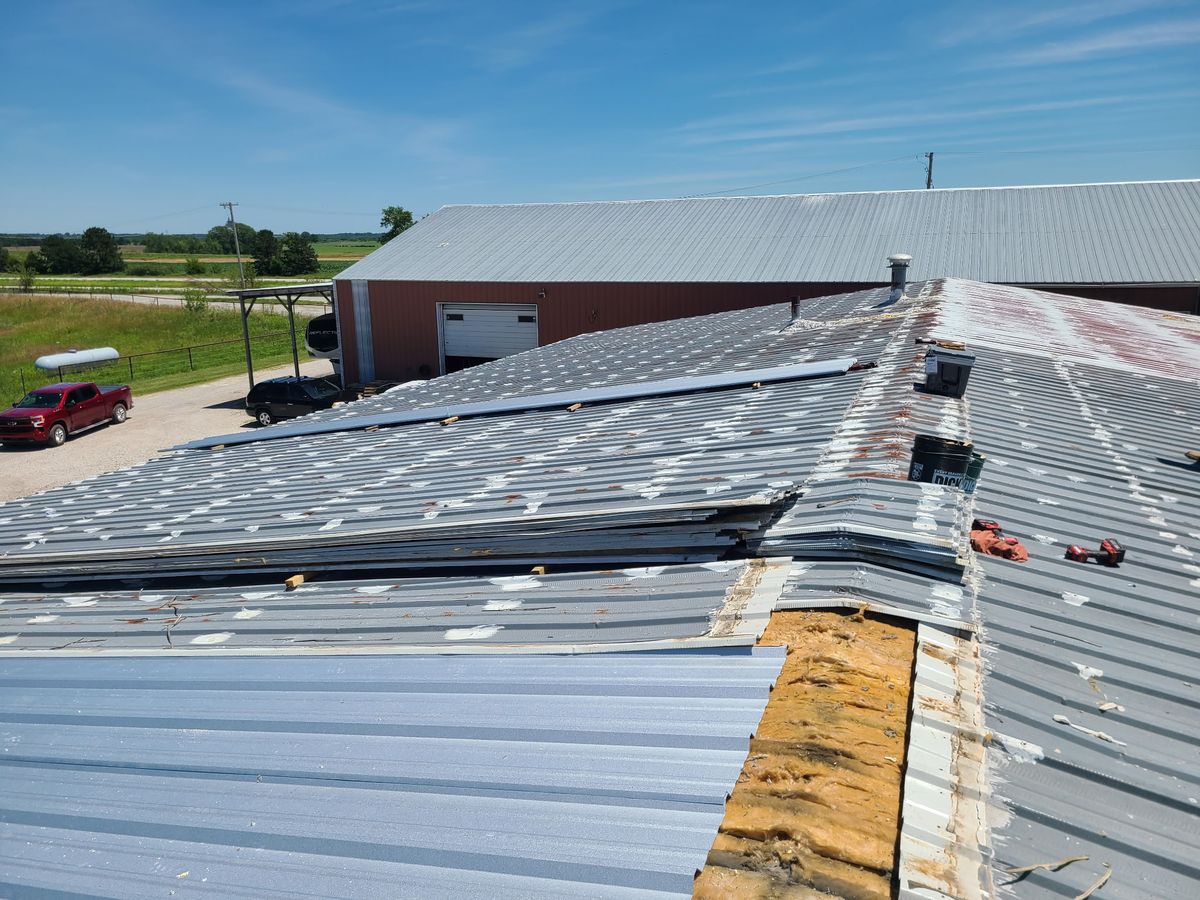 Active metal roof installation on large commercial building